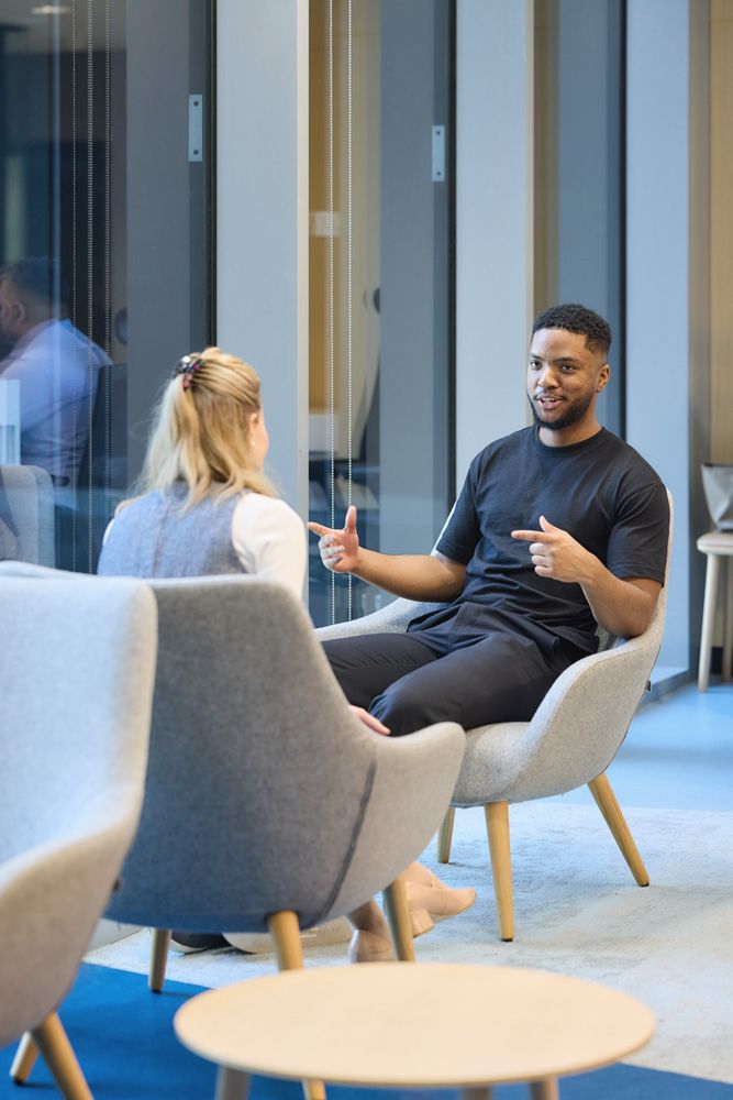 Faculty member in conversation
